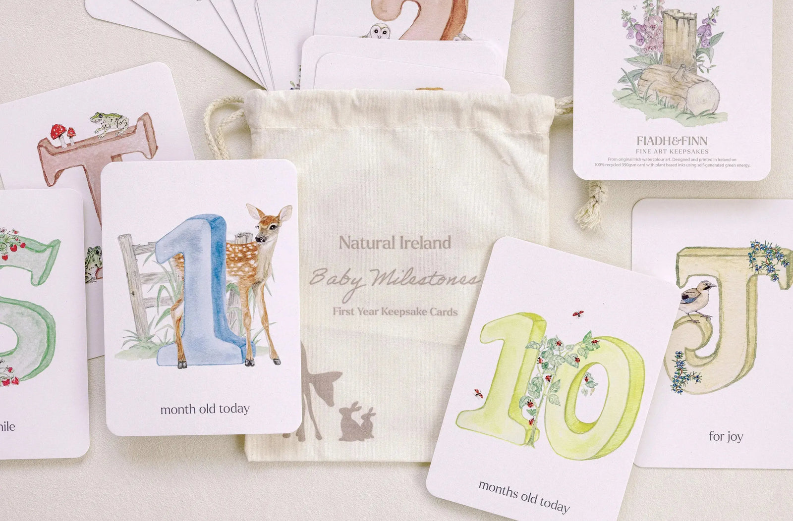 Luxury set of Irish woodland animal themed milestone cards in drawstring cotton bag from Fiadh and Finn, keepsakes.