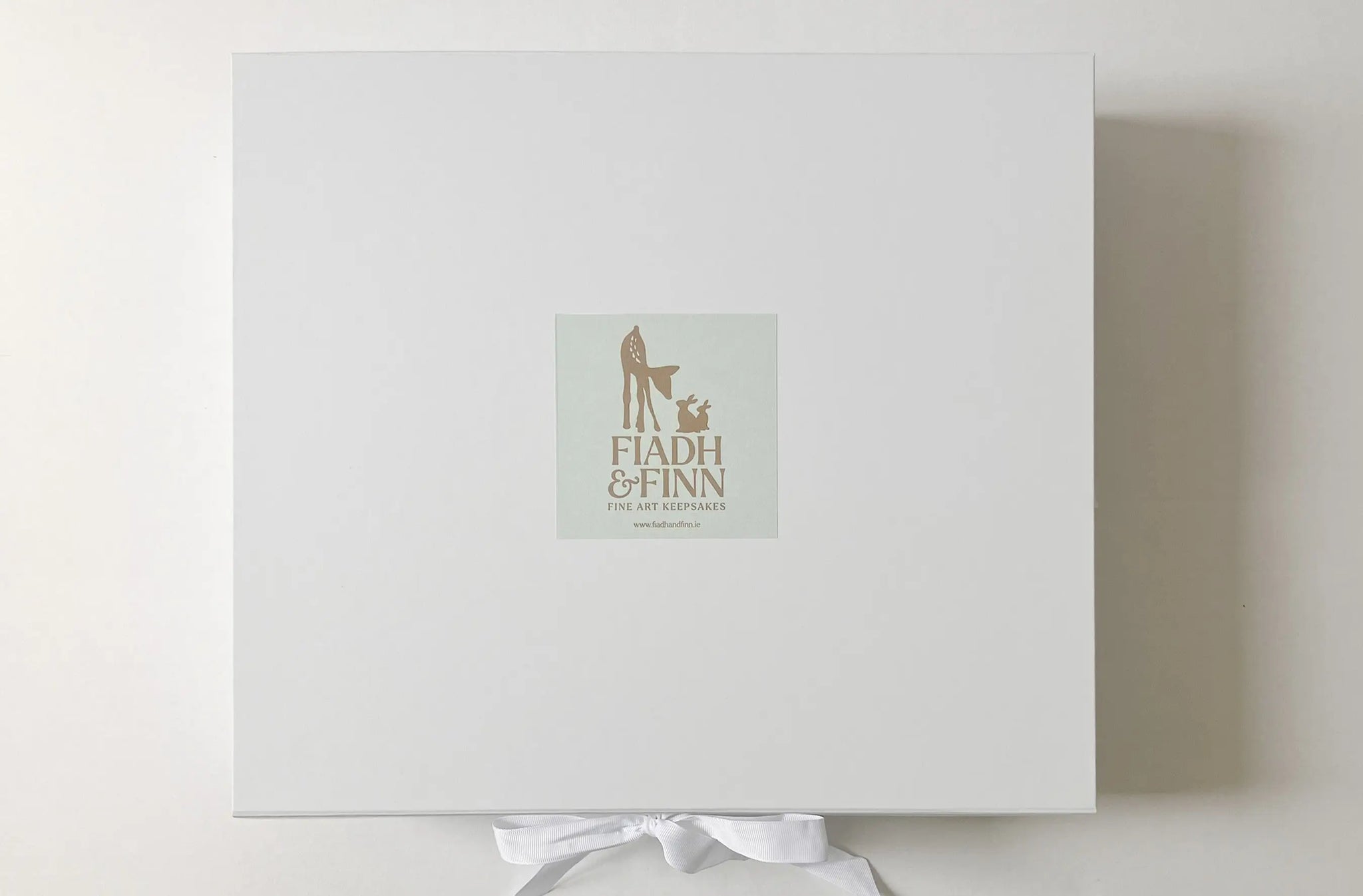 White-Gift-Box-with-Ribbon-.jpg